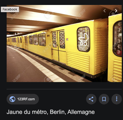 Photo d'un wagon de métro berlinois jaune Jewpop